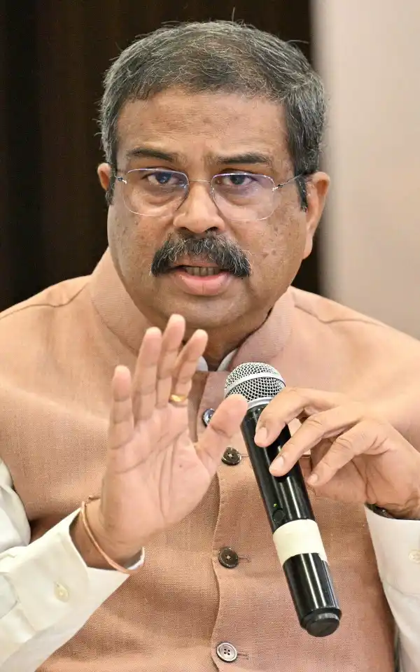 dharmendra pradhan resigns union education minister exam irregularities